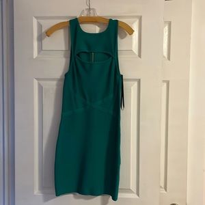 Bebe bodycon dress. Size medium. Like new condition-only worn once!